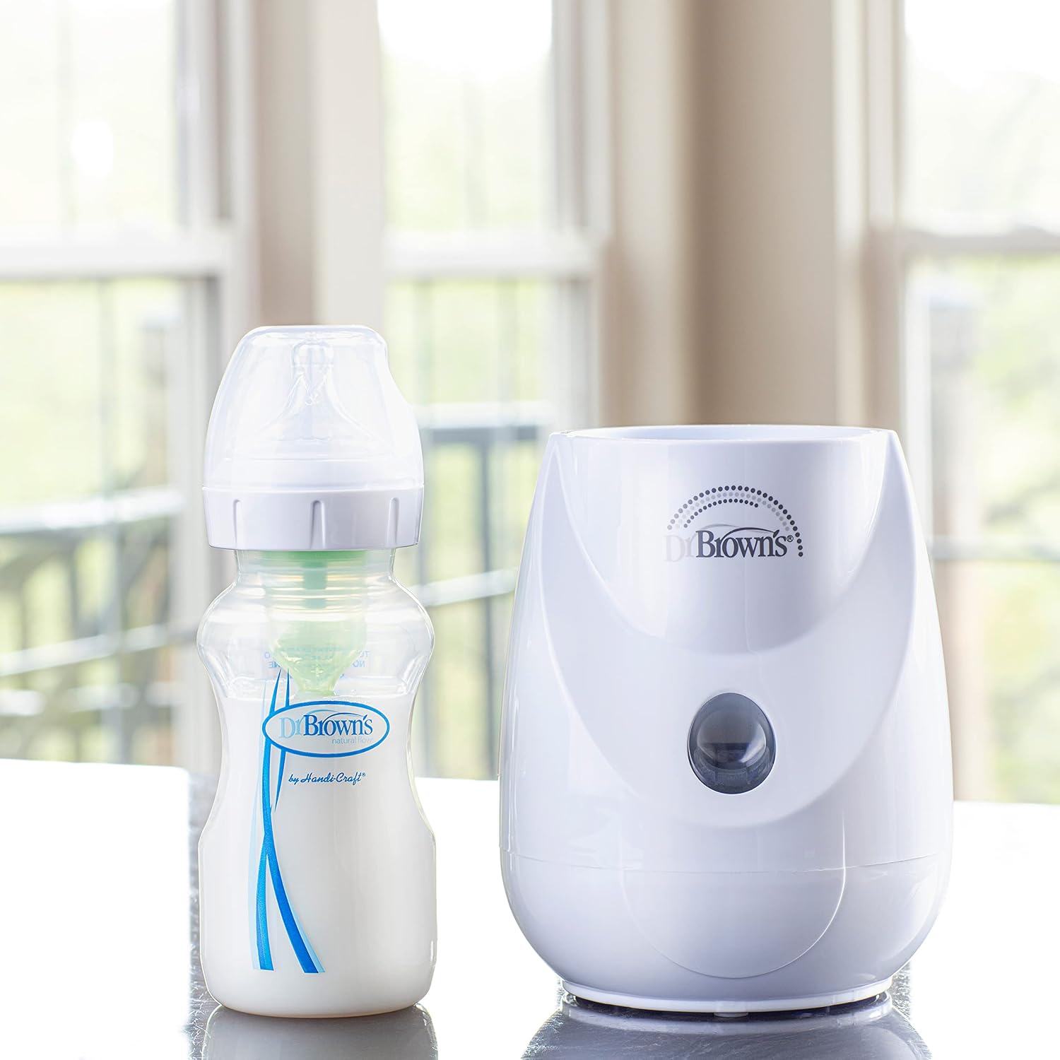 Aquecedor de Mamadeiras Dr. Brown's AC184 Rápido e Eficiente 13 Aquecedor de Mamadeiras Dr. Brown's AC184 Rápido e Eficiente - Imagem 13